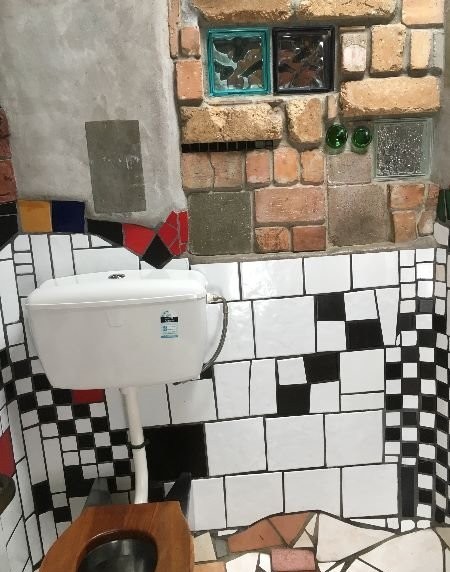 Exploring New Zealand's North Island - Hundertwasser Toilets in Kawakawa